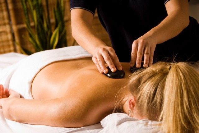 Couple Getting a Massage in Spa
