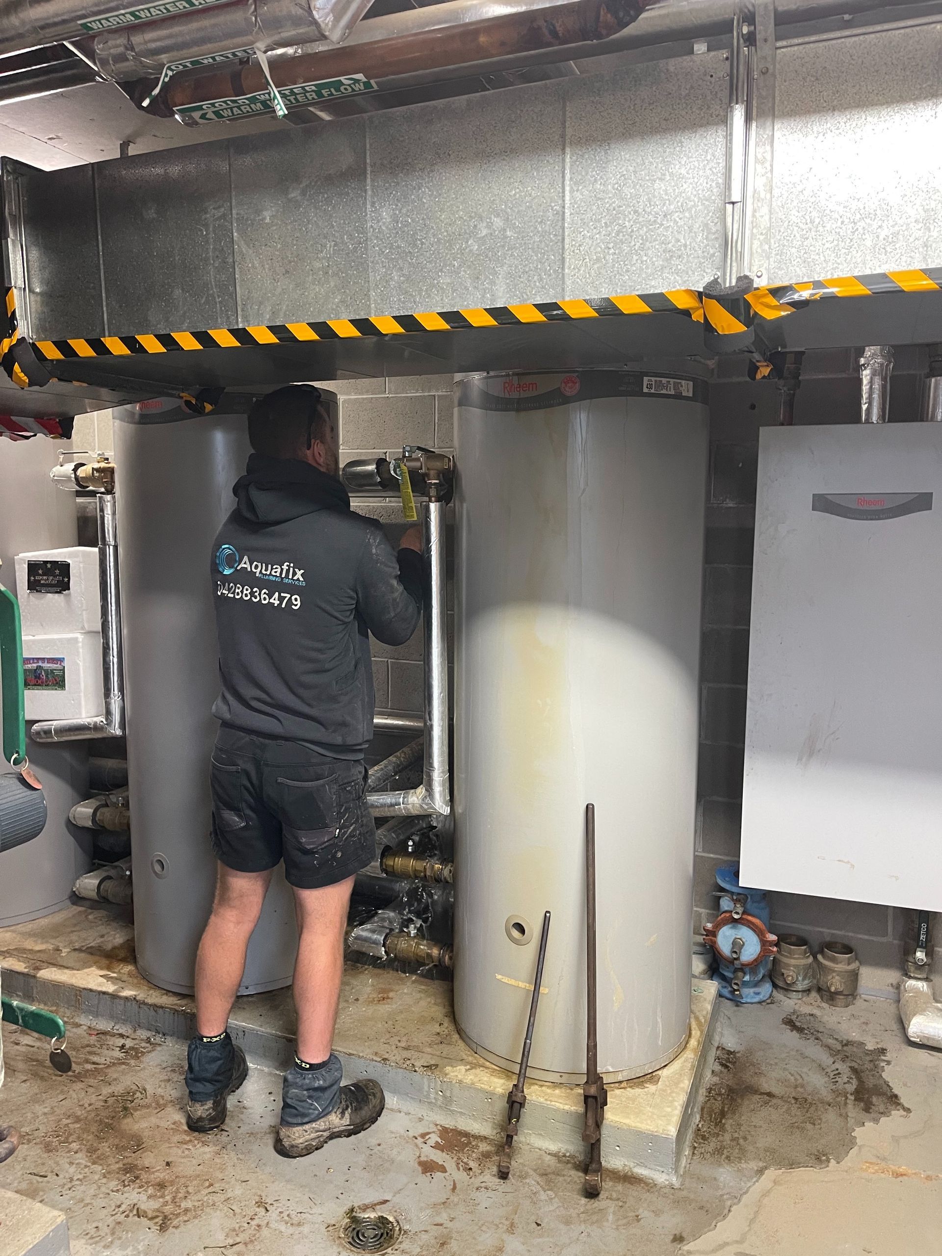 Man Fixing Tanks on the Southern Highlands