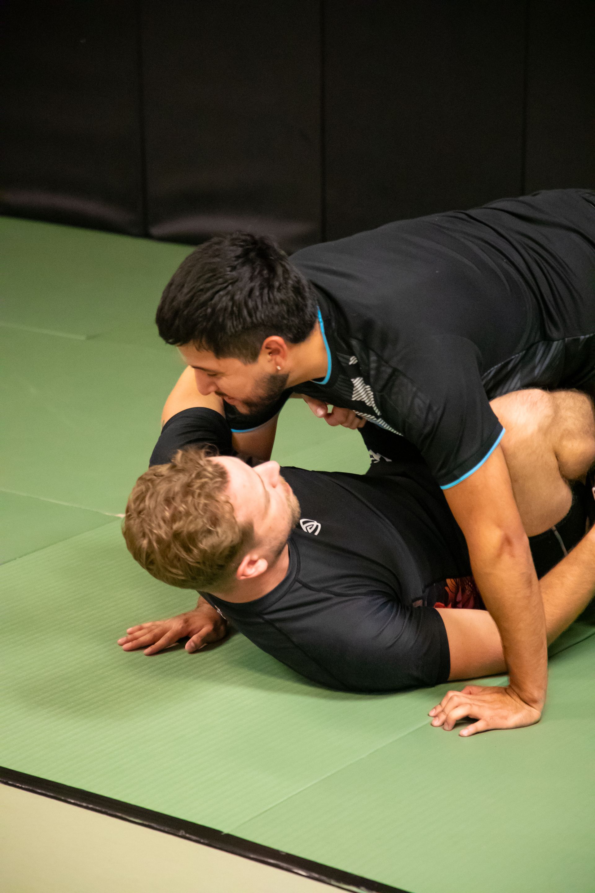 Adults drilling Jiu-Jitsu techniques at Mason Dixon Jiu-Jitsu in East Chambersburg, PA for recovery-focused fitness.