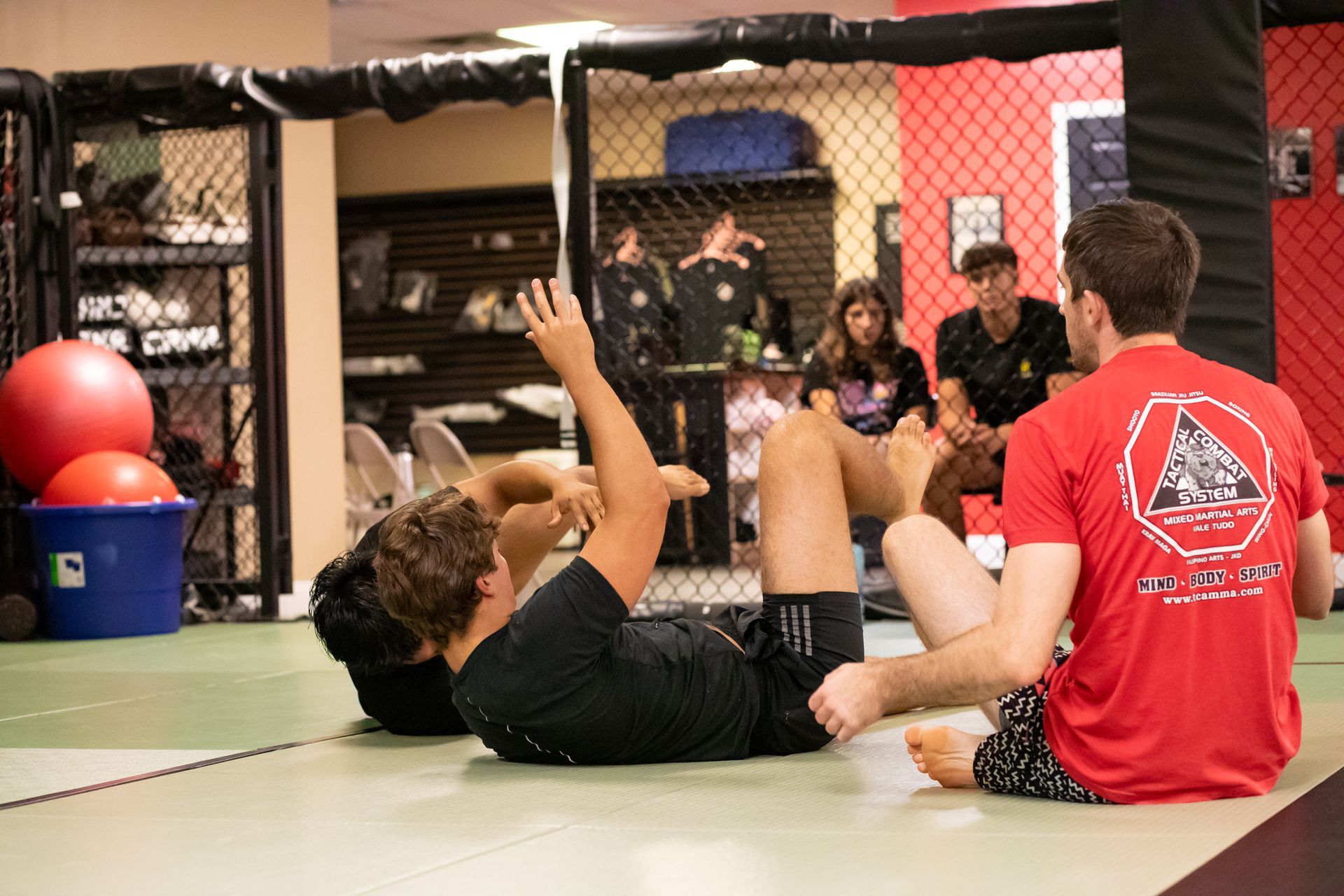 Adults drilling Jiu-Jitsu techniques at Mason Dixon Jiu-Jitsu in East Chambersburg, PA, building calm strength.