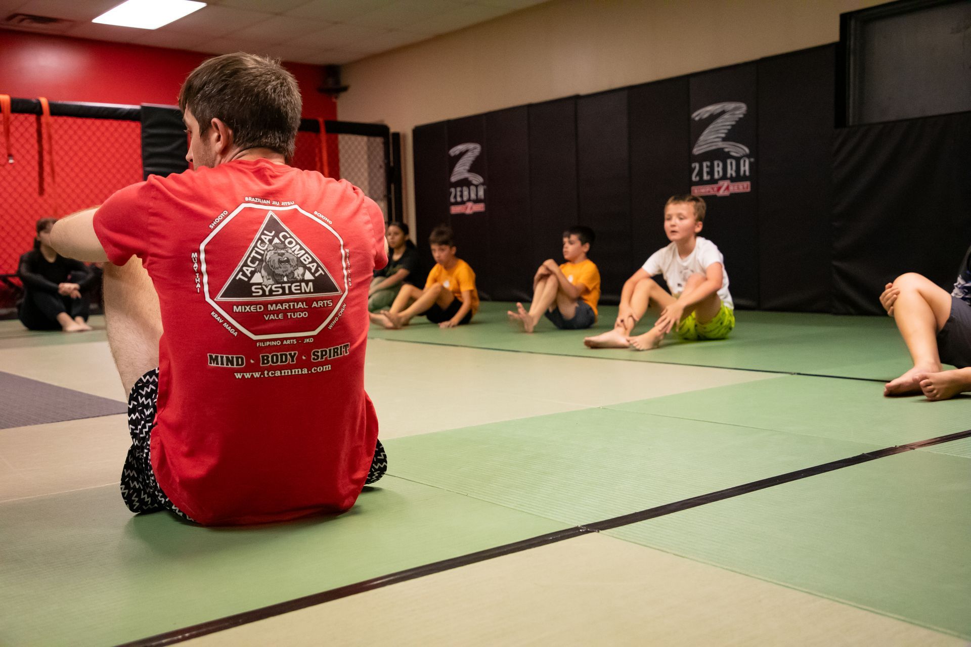 Students drilling Jiu-Jitsu technique at Mason Dixon Jiu-Jitsu in East Chambersburg, PA for strength and focus.