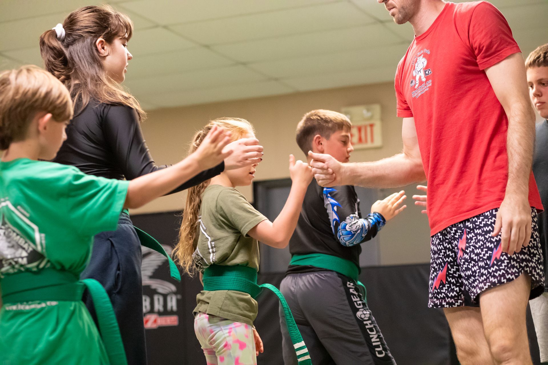 Students drilling Jiu-Jitsu techniques at Mason Dixon Jiu-Jitsu in East Chambersburg, PA to build focus and motivation.