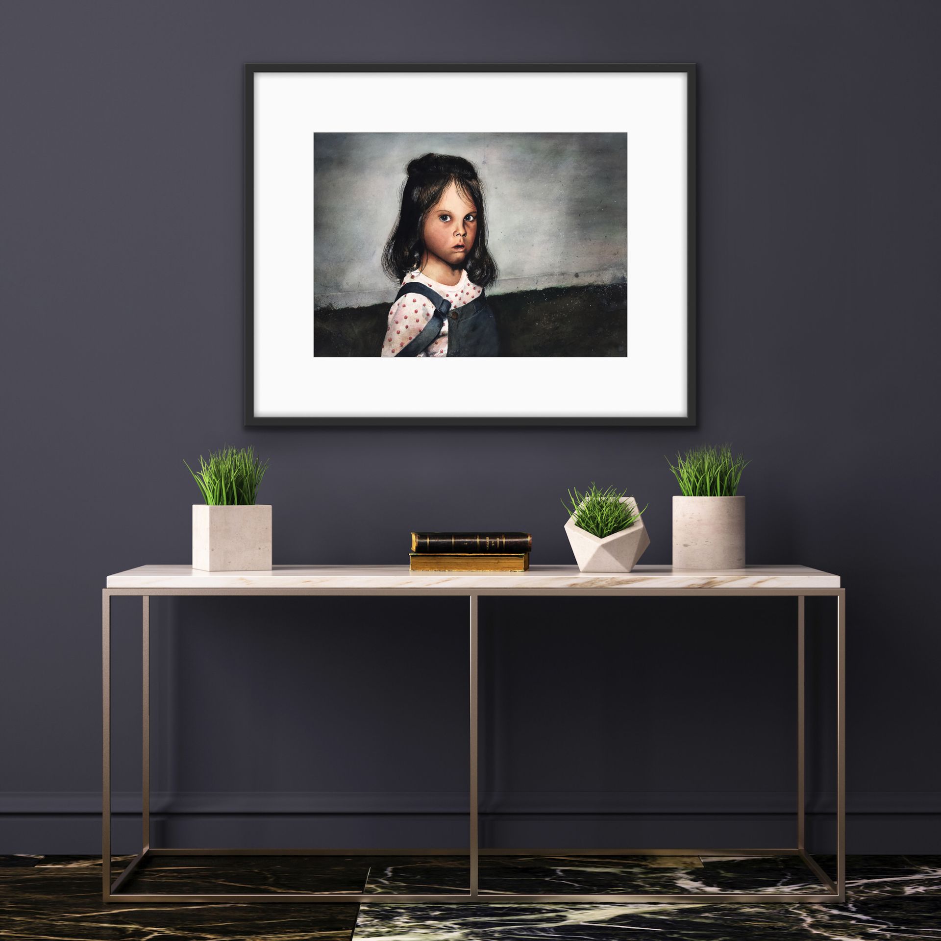 Framed portrait above a console table with potted plants in a modern room