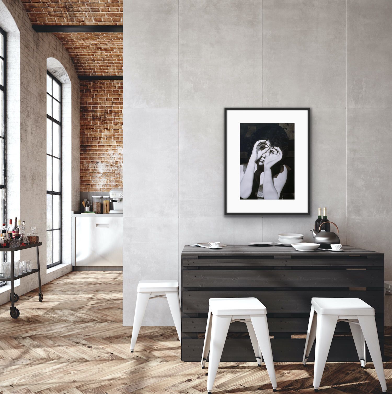 Modern dining area with dark table, white stools, and framed black-and-white portrait on a gray wall