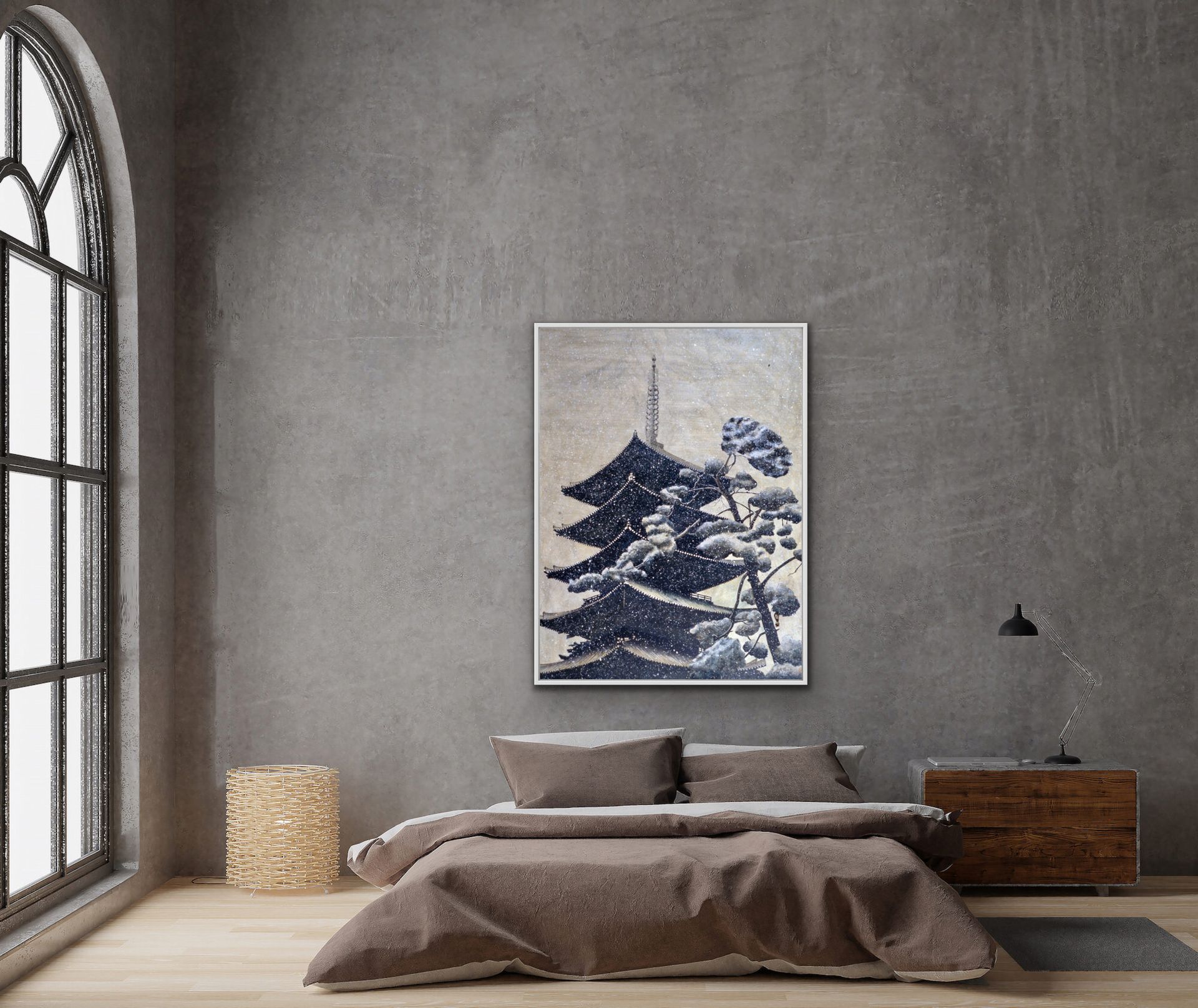 Minimalist bedroom with gray walls, low bed, arched window, and blue tree artwork above the headboard