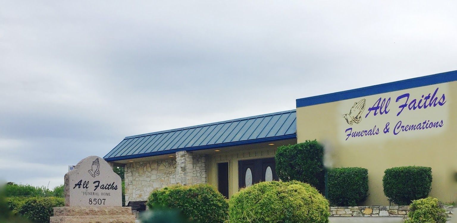 All Faiths Funeral & Cremation building with blue roof and beige walls