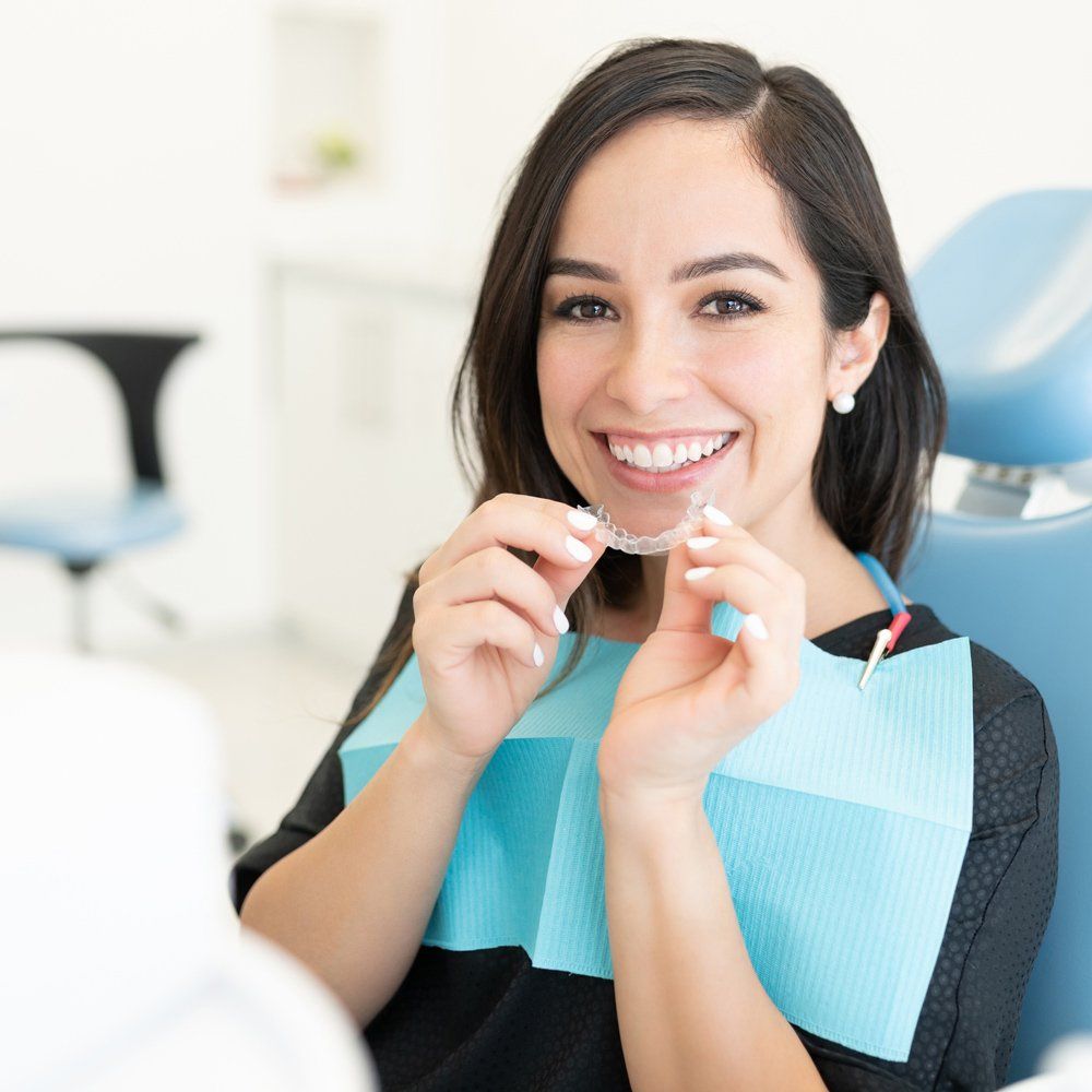 Women With Invisalign — Sarasota, FL — Sterling Dental Women With Invisalign — Sarasota, FL — Sterling Dental