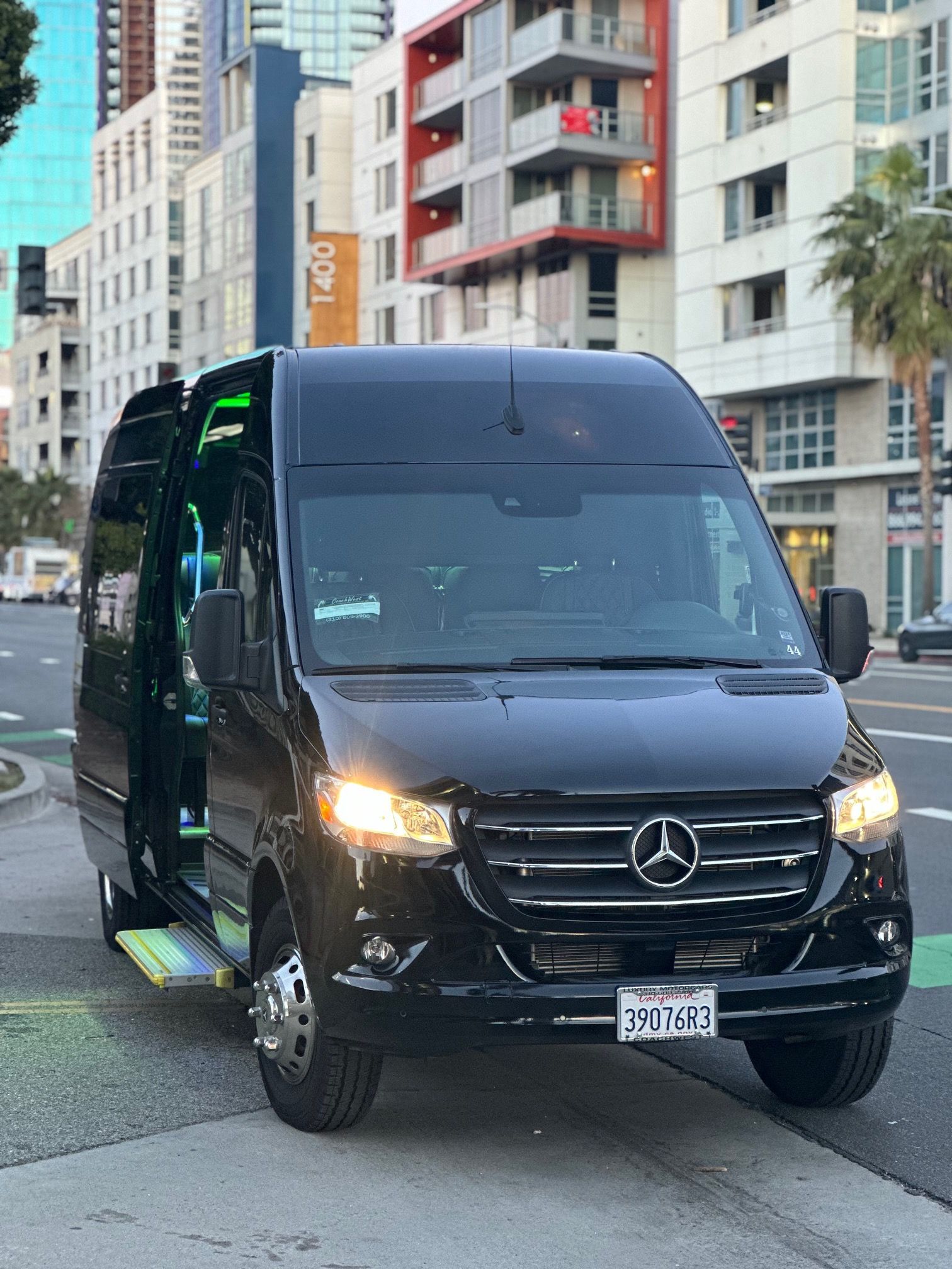 LAX VIP luxury suv at sunset