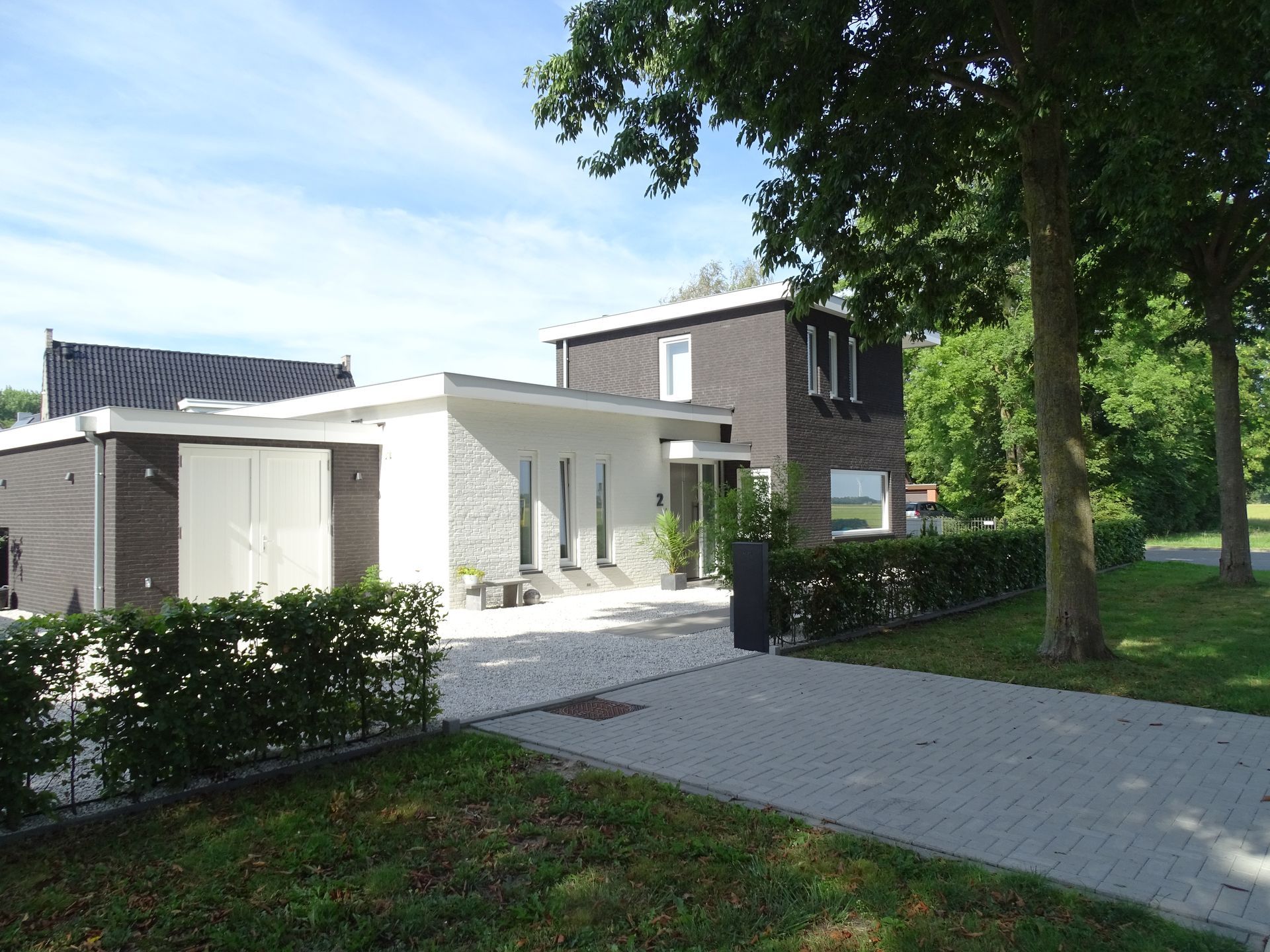 Moderne nieuwbouw woning, villa met strakke lijnen, Bouwbedrijf van Gurp