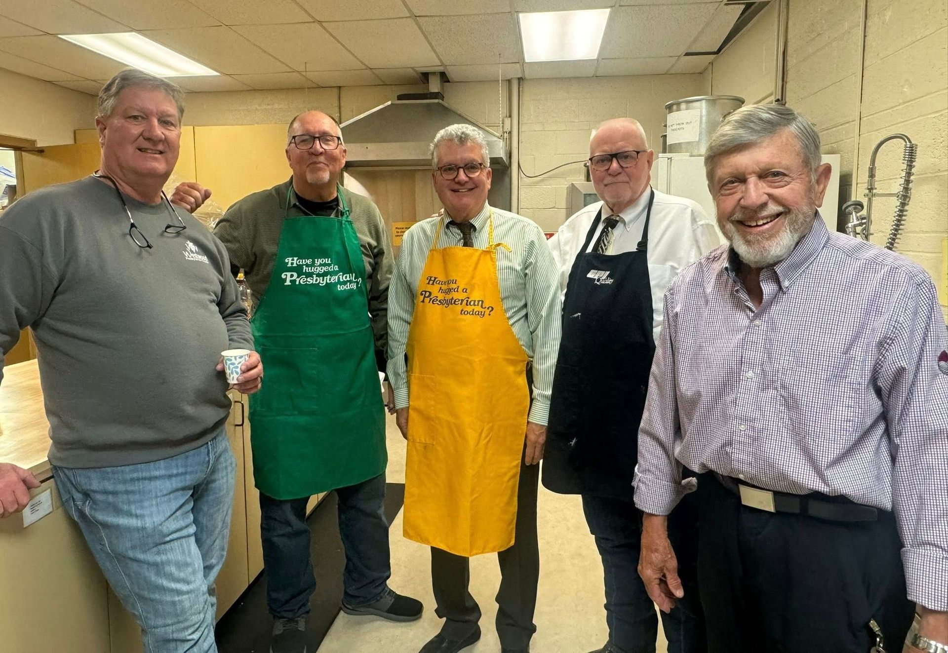 The Westwood men serving breakfast for the congregation