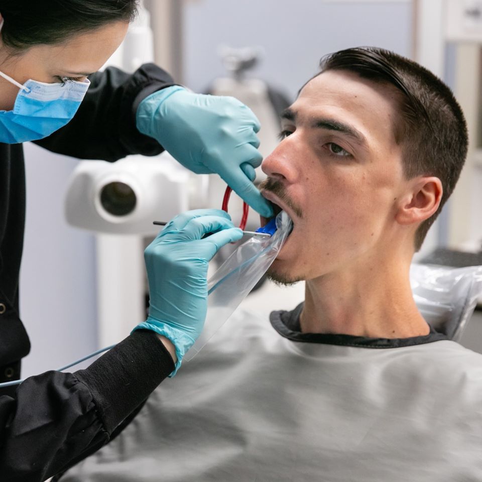 Dental Staff Examining the patient at Family Dentistry Hampton VA