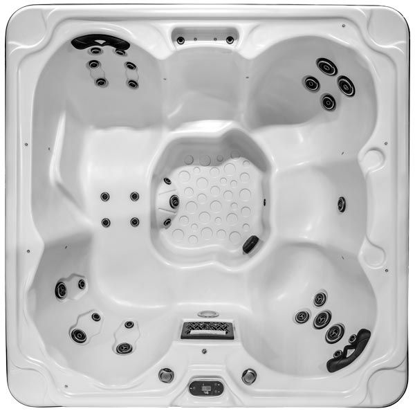 Un spa blanc avec des taches noires dessus