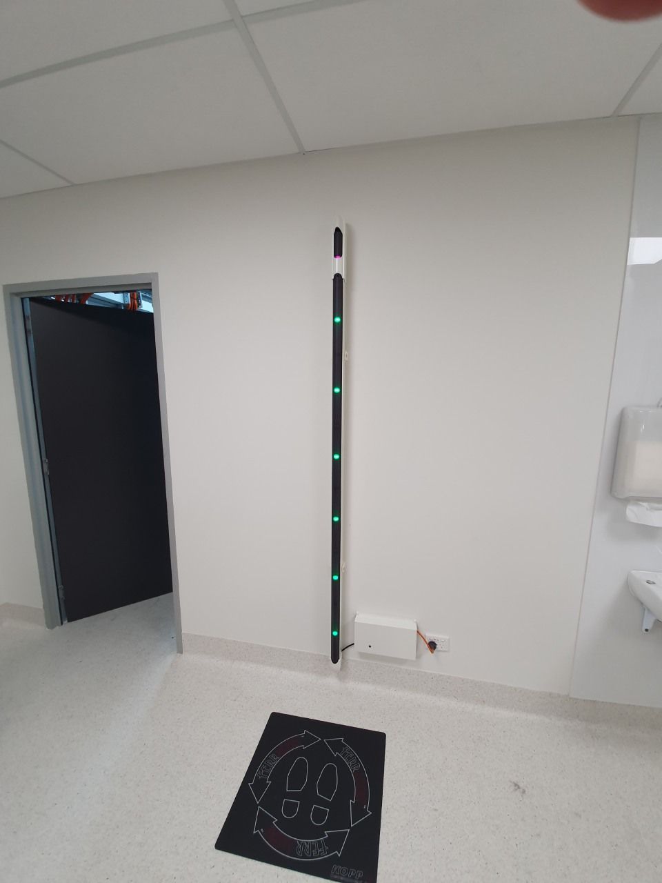 Visual status indicator light installed as part of safety systems in medical and commercial environments