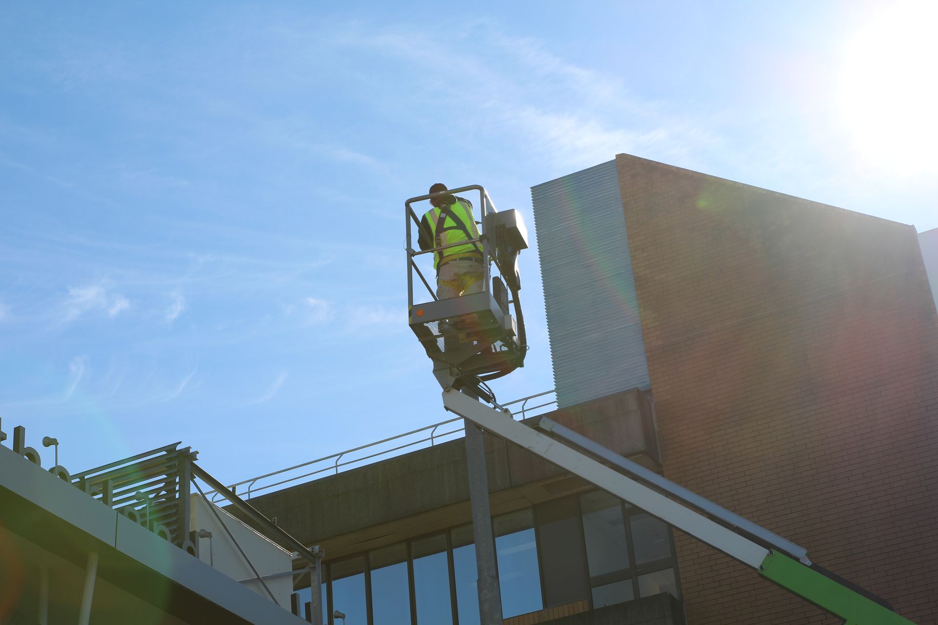 High-access electrical installation using an elevated work platform for medical and commercial facilities