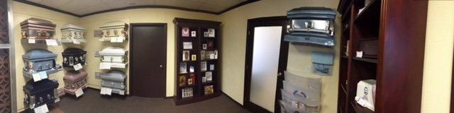 Interior office with shelves, cabinet, and doorways in a small room
