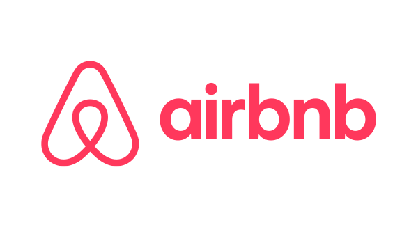 El logotipo de Airbnb es rojo y blanco sobre un fondo blanco.