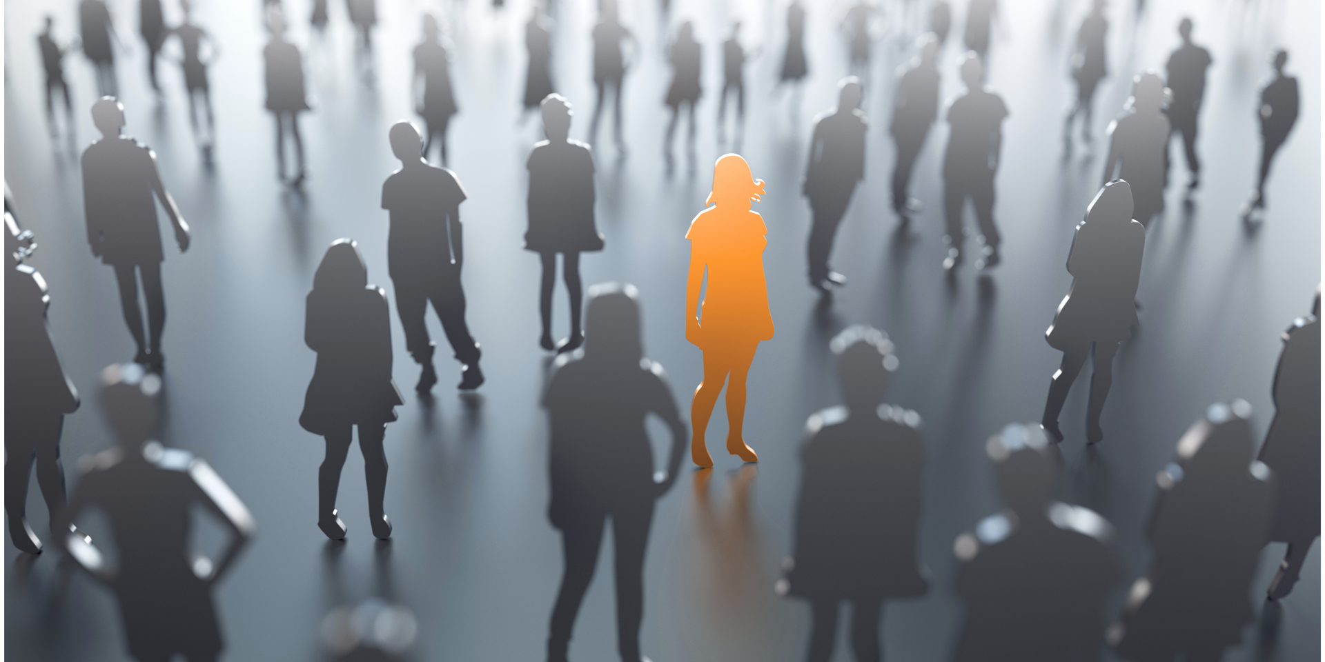 A single person glowing with bright orange light stands out in a large, shadowy crowd of gray silhouettes.