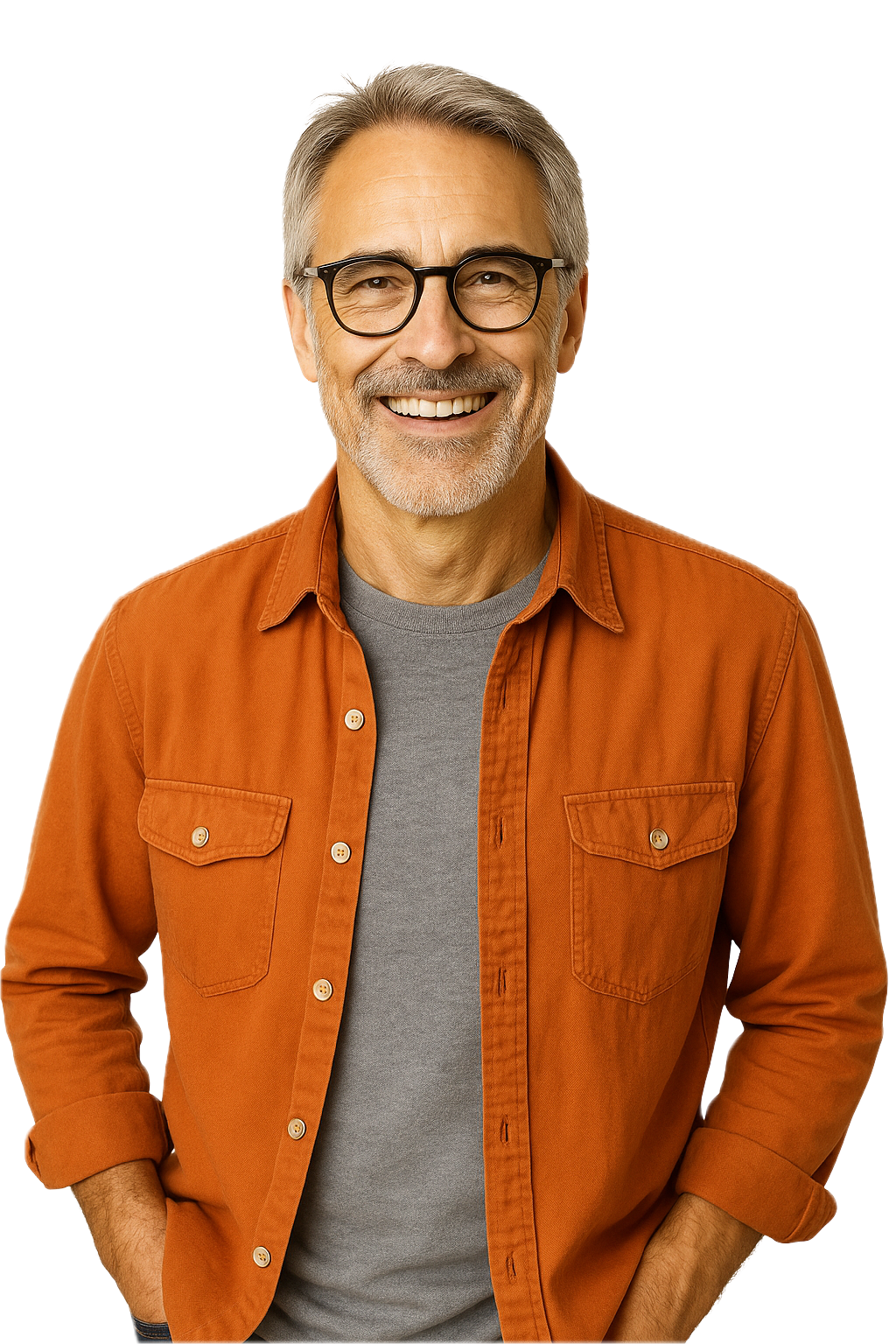 Man in orange shirt and glasses smiling, hands in pockets.