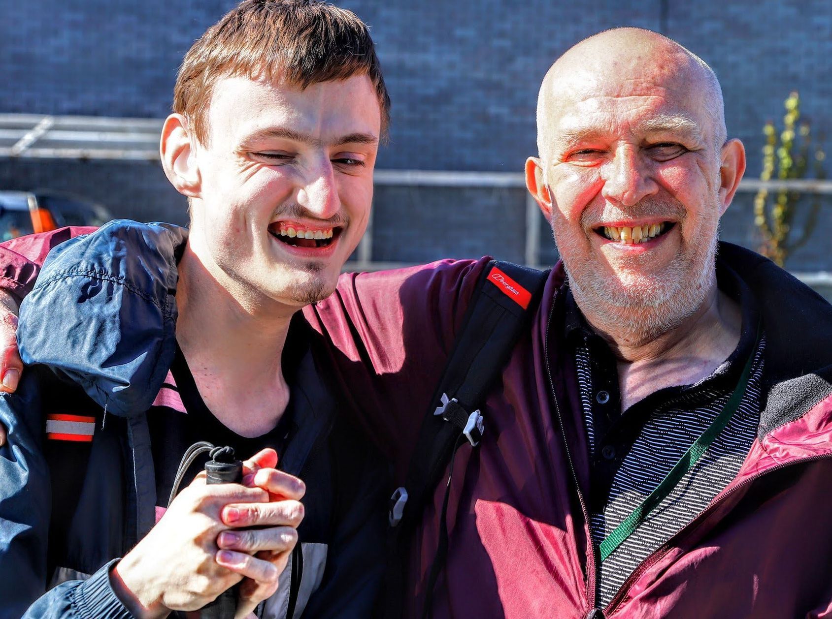 Young man being supported to enjoy social time doing what is meaningful to him.