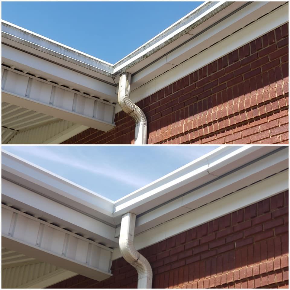 Before and after of a building's exterior, showing cleaned white gutters and brick wall against a blue sky.