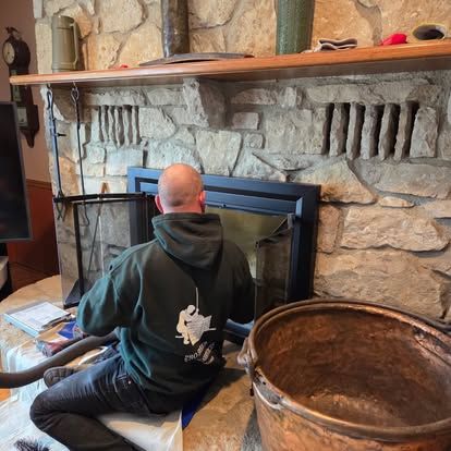 Man Cleaning The Brick Chimney — Columbus, OH — Pro Sweep Chimney Man Cleaning The Brick Chimney — Columbus, OH — Pro Sweep Chimney