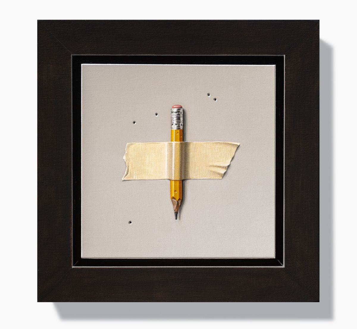 Short yellow pencil taped to wall.