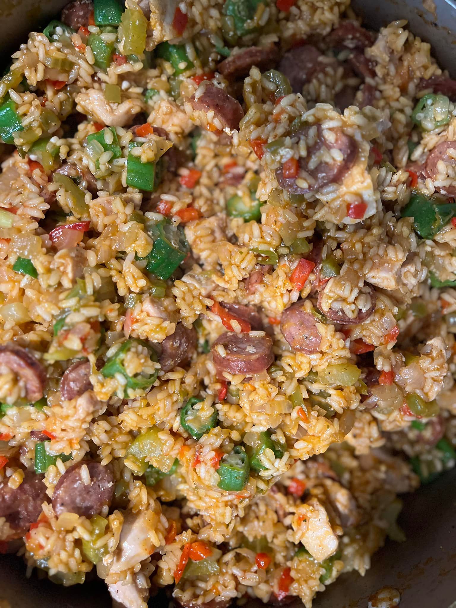 A bowl of cajun/creole food from Baker Street food truck.