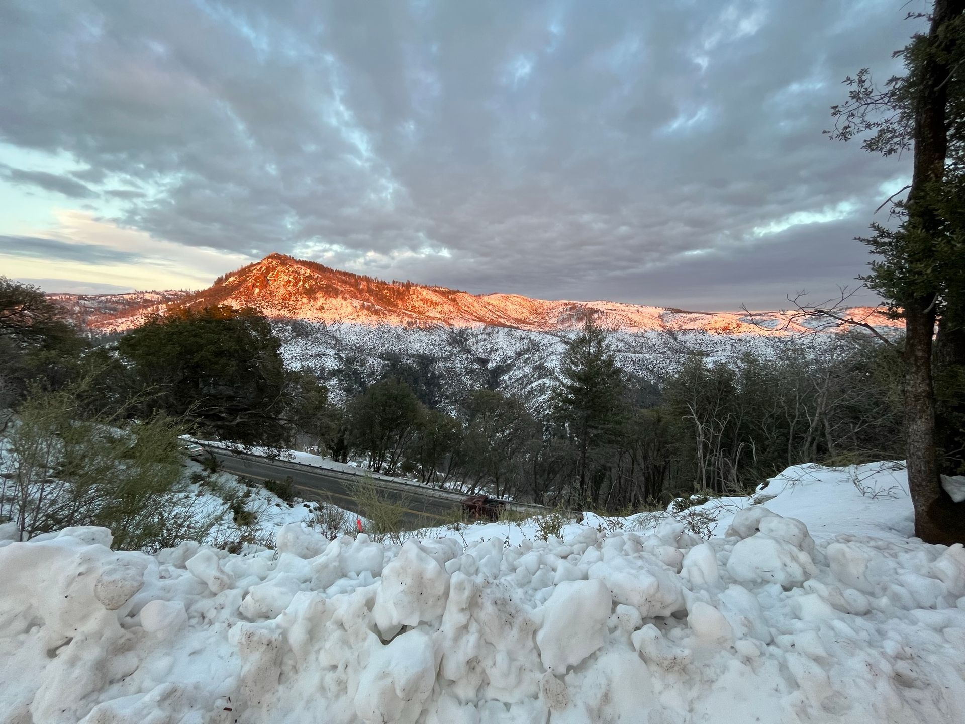 A snowy hillside with a mountain in the background  in Paradise and Magalia, California