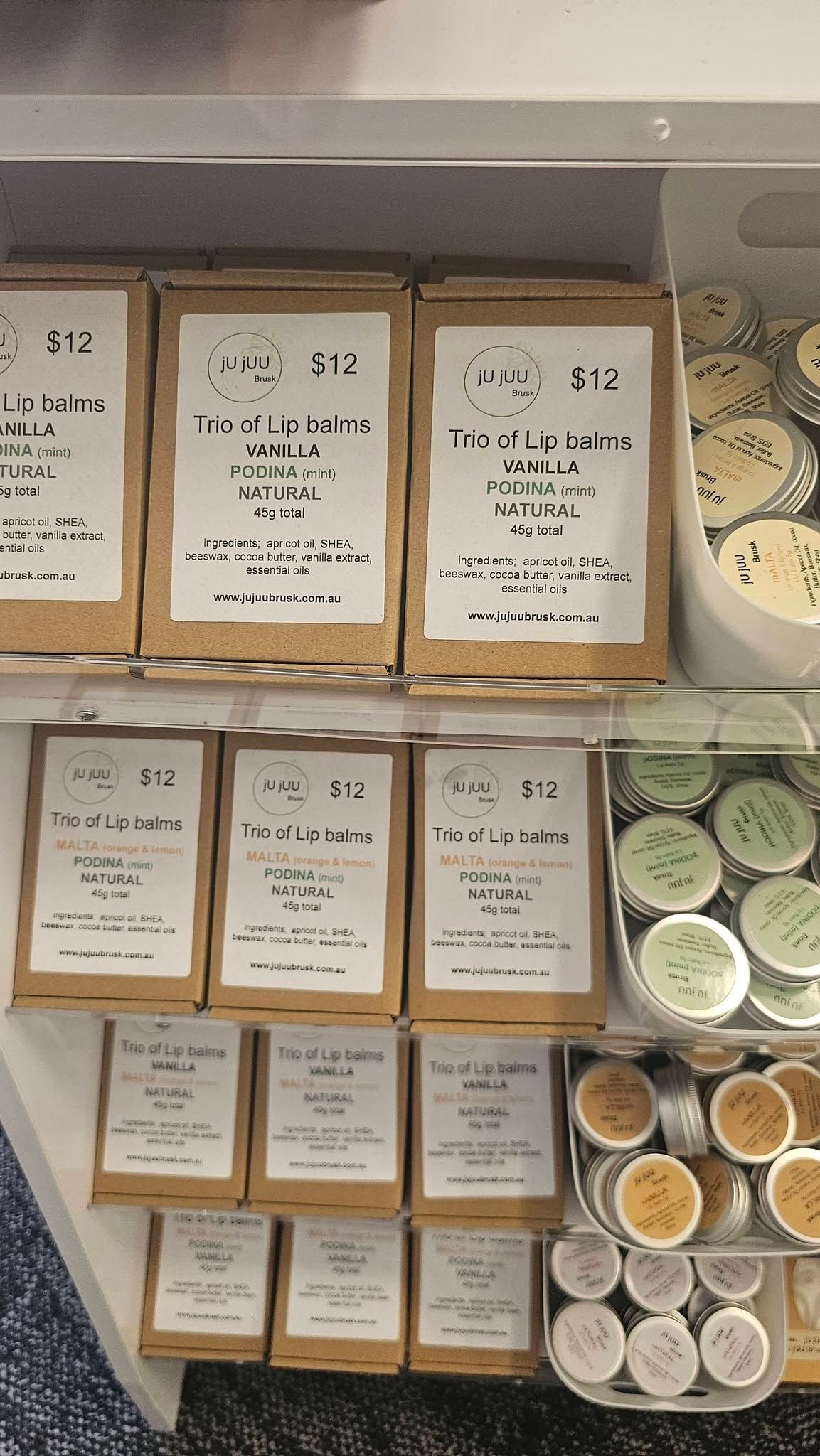 Shelf of Neatly Labeled Boxed Items and Small Jars on Display in a Store Aisle — Tilligerry Collective in Tilligerry Peninsula, NSW