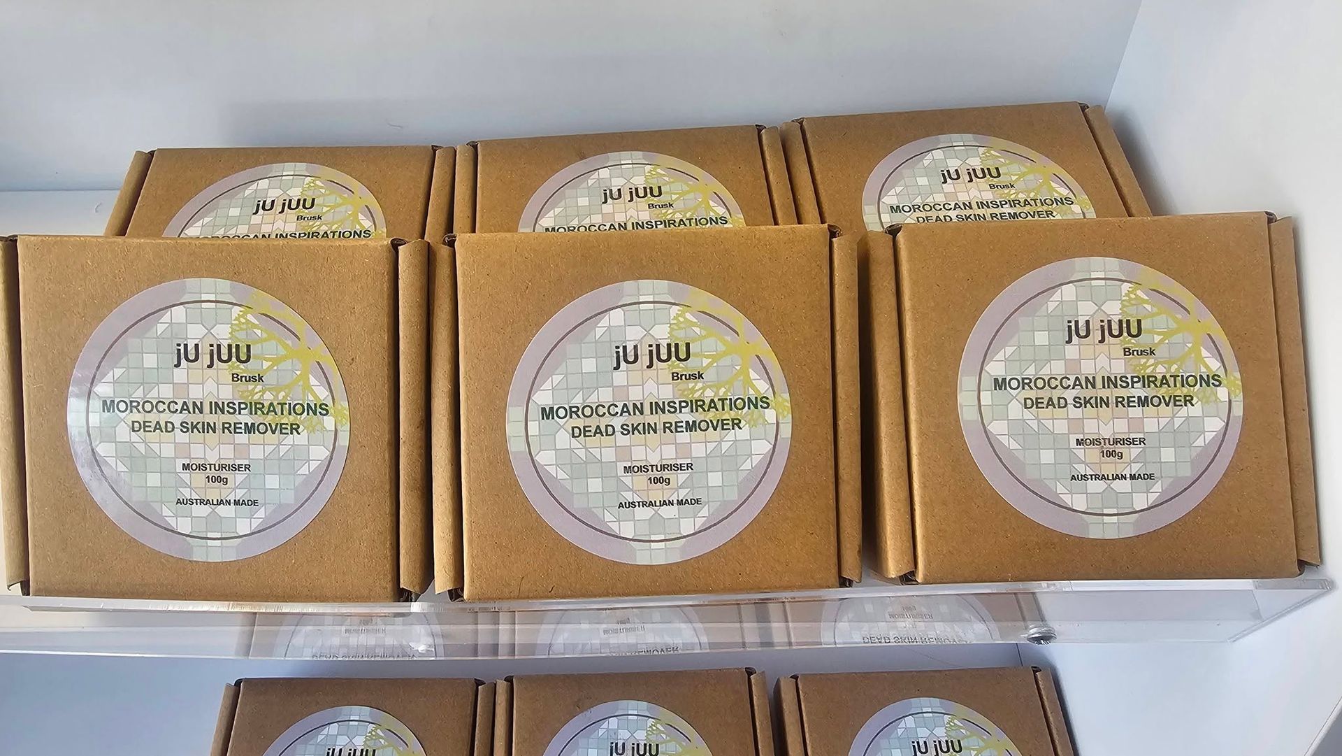 Rows of Brown Cardboard Boxes With Circular Product Labels — Tilligerry Collective in Tilligerry Peninsula, NSW