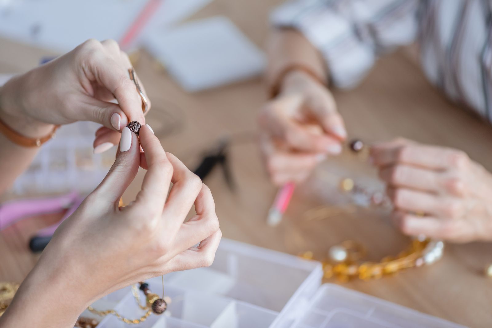 Hands Making Jewelry With Beads and Tools at a Tabletop — Tilligerry Collective in Tilligerry Peninsula, NSW