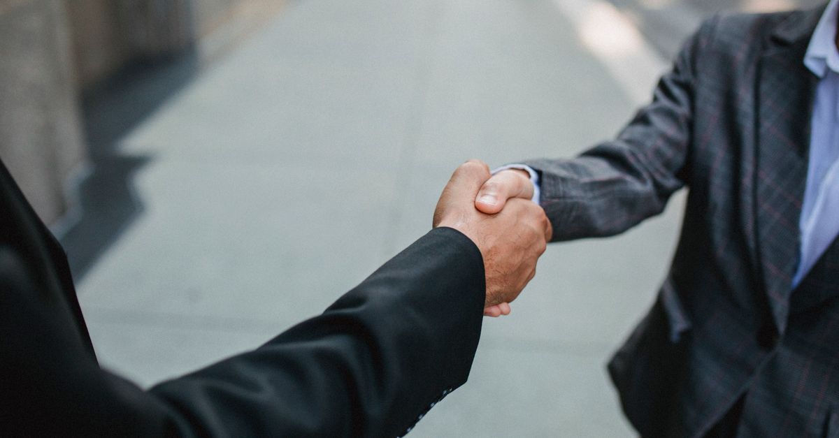 Salesperson following up with a prospect after a networking event