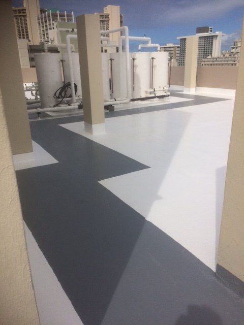 A rooftop with a gray and white geometric pattern on it