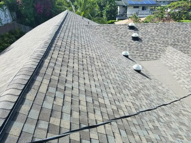 A roof with a lot of shingles on it