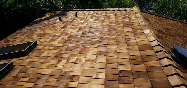 A wooden roof with a pattern of squares on it.