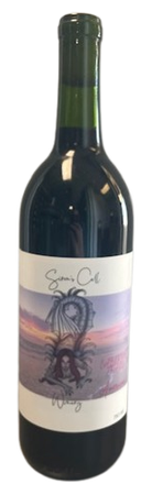 Dark wine bottle with a cream label showing a stylized tree and sunset scene
