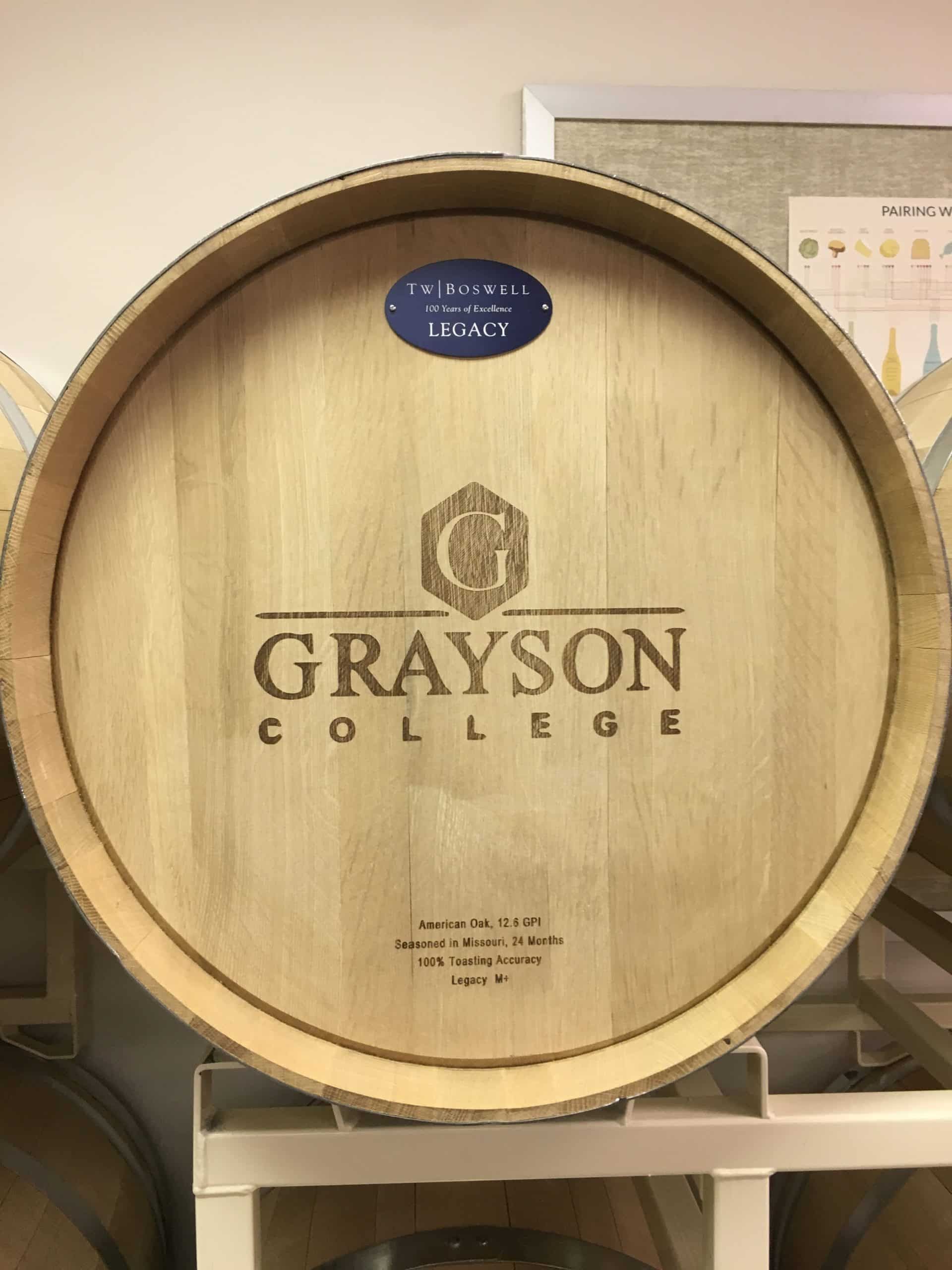 Wooden barrel top with Grayson College logo and a small blue “LCC-CT” sticker.