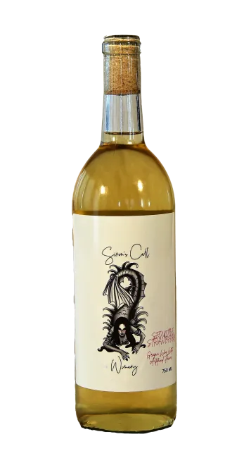 A bottle of pale white wine with a cream label and cork stopper on a white background