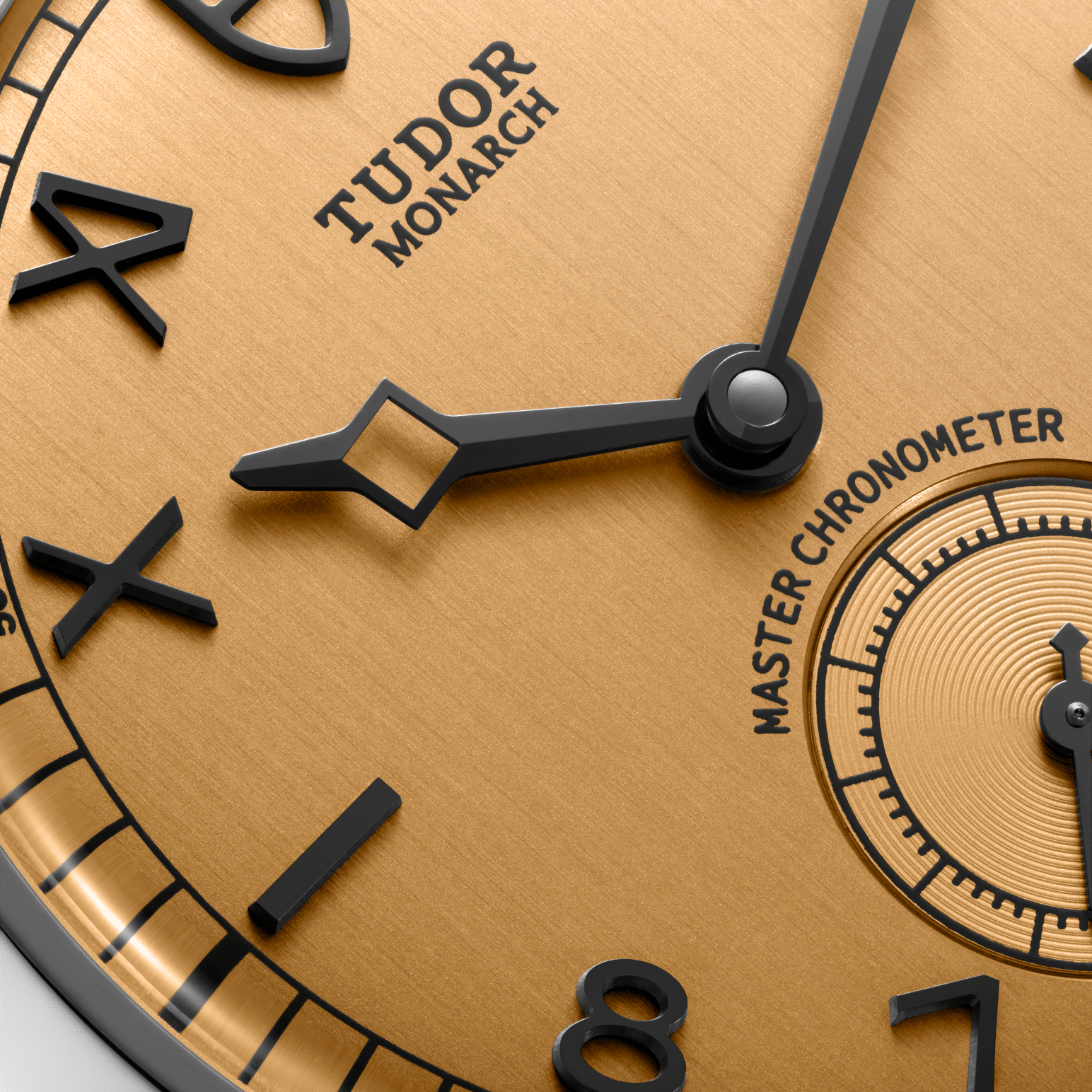 Detail van de wijzerplaat in donker champagnekleur van de nieuwe tudor Monarch