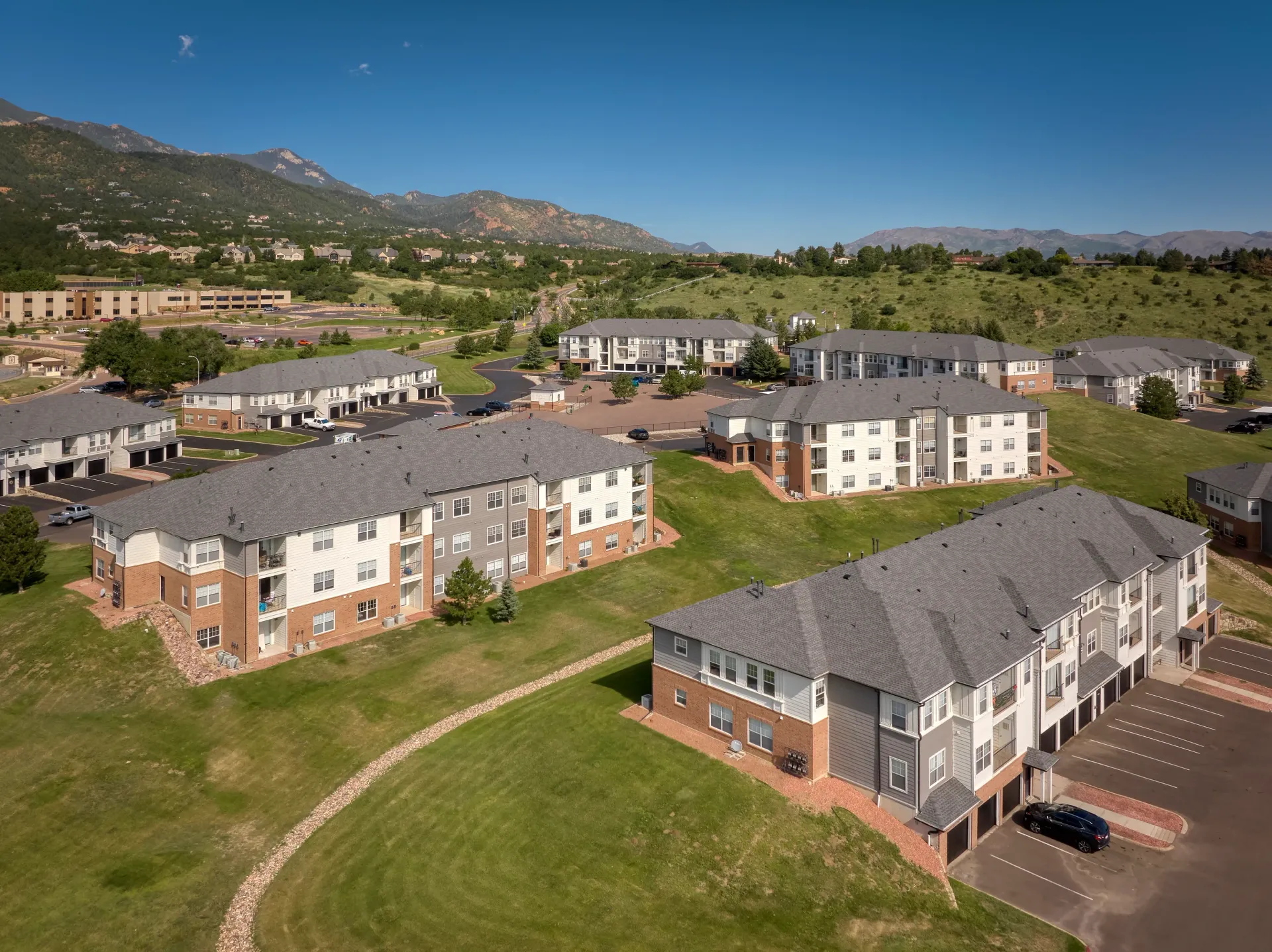 Apartment buildings with mountain backdrop