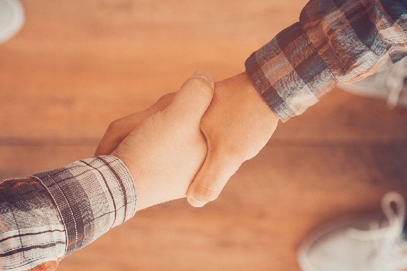 people shaking hands