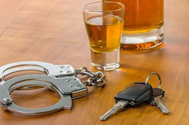 Keys, Handcuffs and Alcohol — Central Valley, NY — Schonberg Law Offices Keys, Handcuffs and Alcohol — Central Valley, NY — Schonberg Law Offices