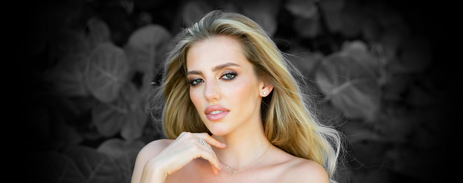 Photo of a blonde woman with a beautiful smile. 