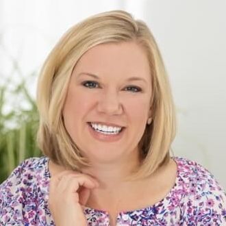 Photo of a smiling Revive Dentistry patient