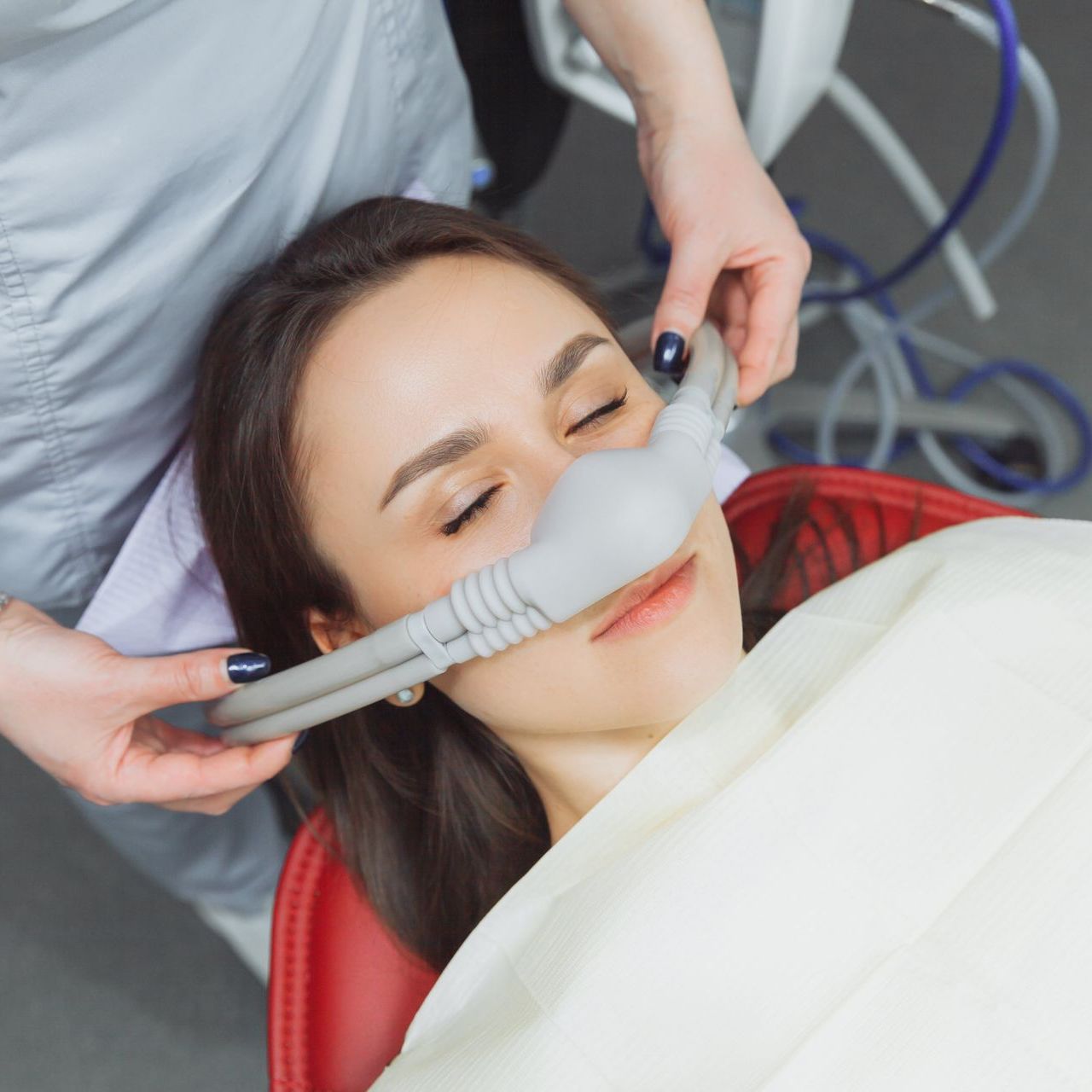 Image of a patient being sedated for a dental procedure.