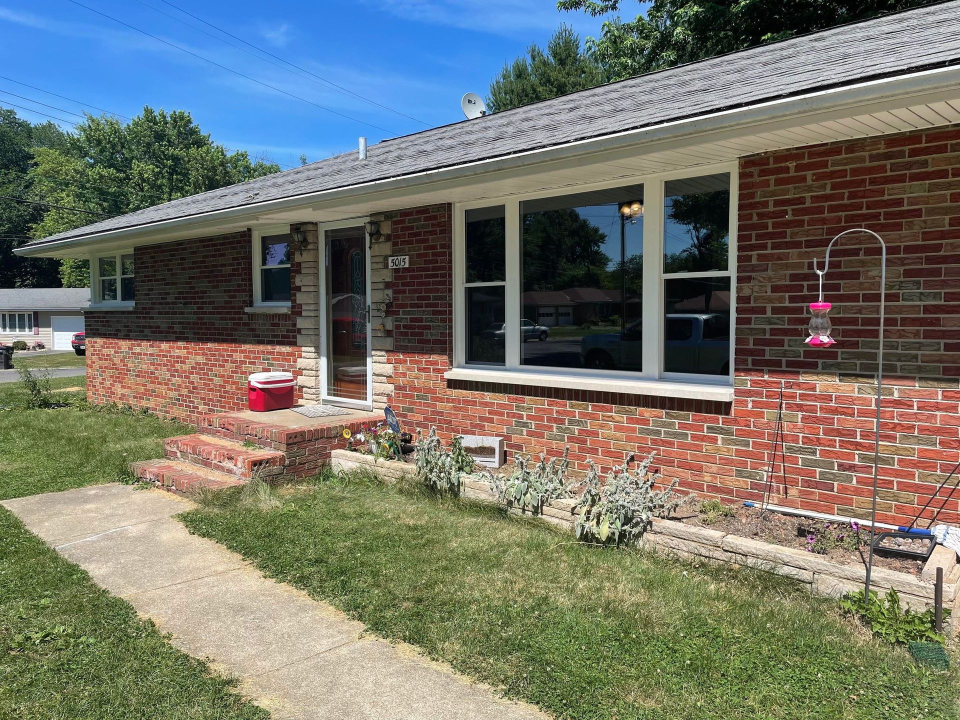 front door of brick home