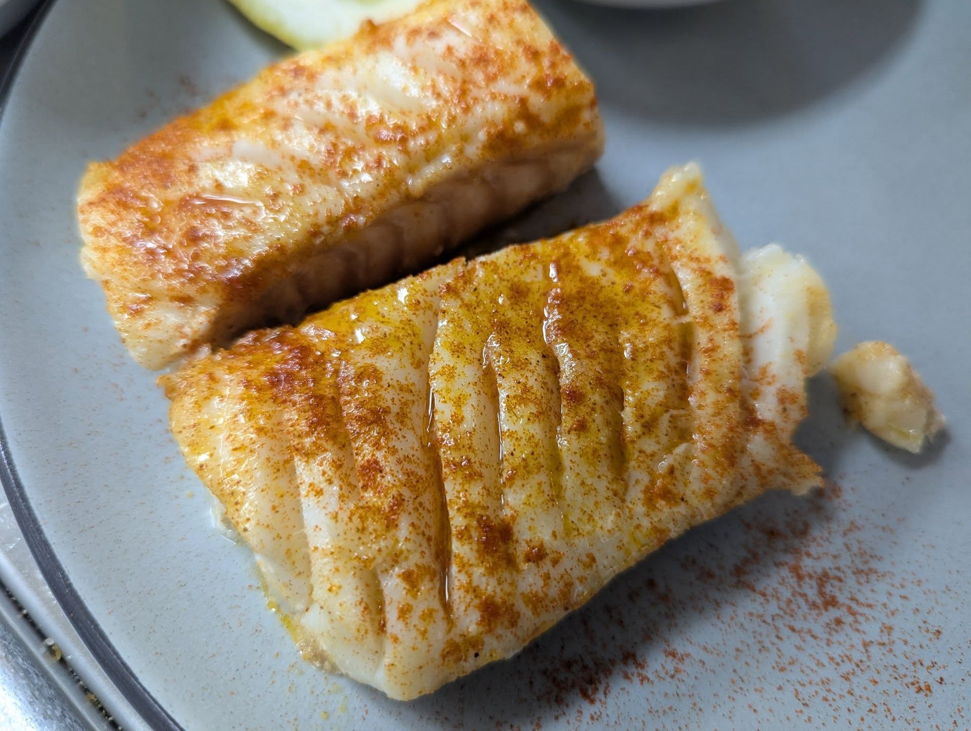 Broiled fish served at The Phattest