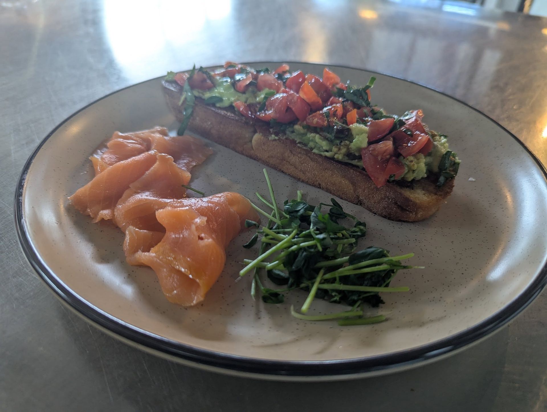 Avocado toast, salmon and spinach