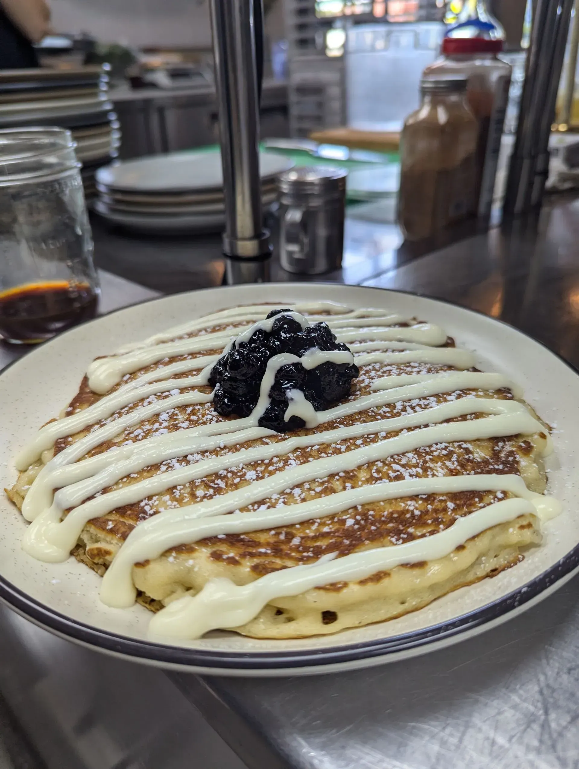 Homemade pancakes with berries and cream