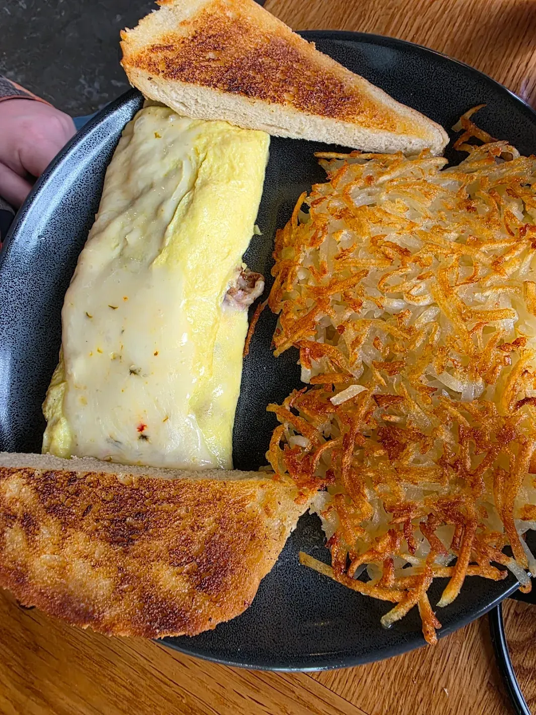 Homemade omelet with hash browns from The Phattest